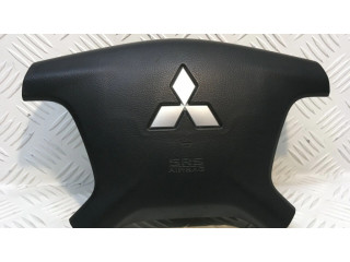 Подушка безопасности водителя 7030A099 Mitsubishi Pajero