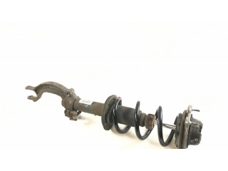 Передний амортизатор