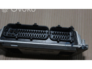 Блок управления двигателя 03E906023J   Skoda Roomster (5J)