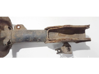 Передний амортизатор