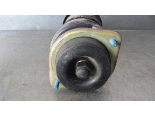 Передний амортизатор