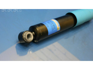 Передний амортизатор