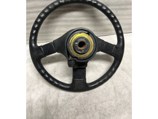 Руль Mitsubishi Colt 1989 - 1992 года MB564540, 1313