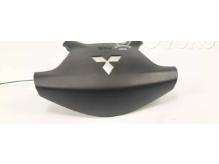 Подушка безопасности водителя 7030A099 Mitsubishi Pajero