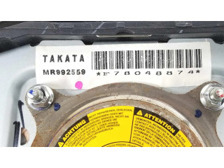 Подушка безопасности водителя 7030A851XA Mitsubishi L200