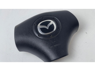 Подушка безопасности водителя B33M57K00, T93187A Mazda 323