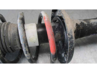 Передний амортизатор