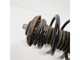 Передний амортизатор с пружиной      