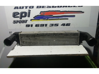 Интеркулер  77897930   BMW X3 E83 