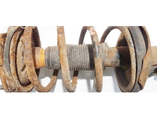 Передний амортизатор