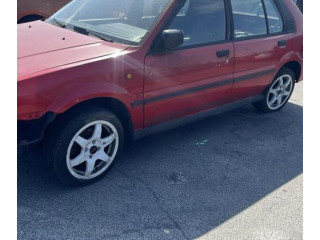 Zpětné zrcátko Nissan Sunny 1990