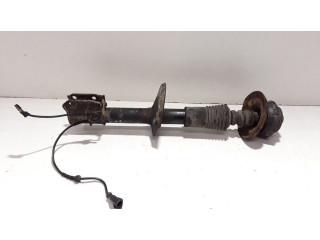 Передний амортизатор