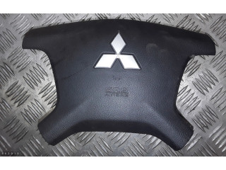 Подушка безопасности водителя 7030a099 Mitsubishi Pajero