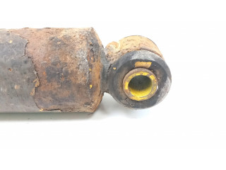 Передний амортизатор