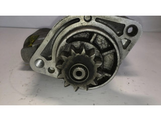 Стартер 23300VK500, M002TS0571 Nissan Navara D40