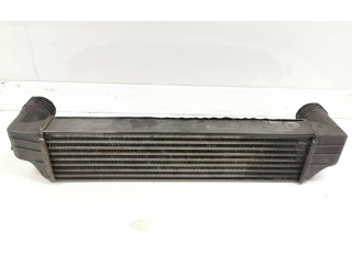 Интеркулер  77897930   BMW X3 E83 