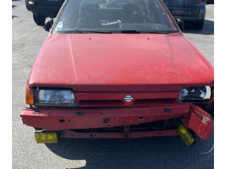 Zpětné zrcátko Nissan Sunny 1990