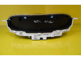 Панель приборов    Mazda 323       