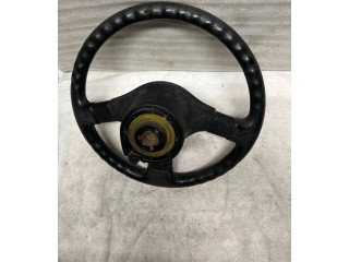 Руль Mitsubishi Colt 1989 - 1992 года MB564540, 1313