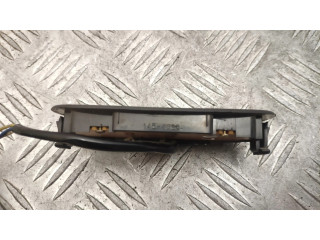 Кнопка крюка в багажнике