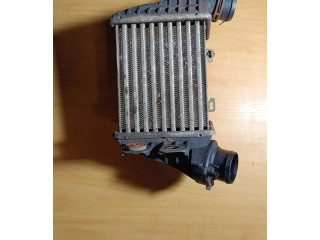 Интеркулер 1231877 Volkswagen Golf III