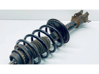 Передний амортизатор с пружиной      