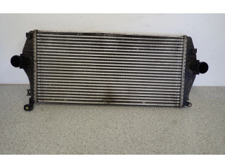 Радиатор интеркулера    KIA Carens II