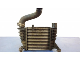 Интеркулер 144619U21A Nissan Note (E11)