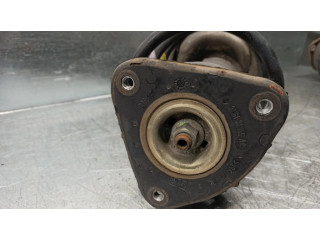 Передний амортизатор