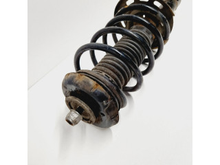 Передний амортизатор с пружиной      