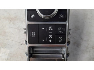 Включатель регулировки высоты / жесткости ходовой части