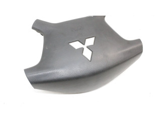 Подушка безопасности водителя 7030A099 Mitsubishi Pajero