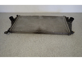Радиатор интеркулера    KIA Carens II