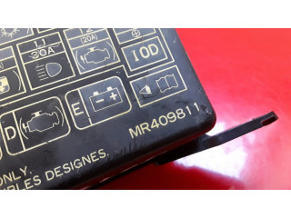 Блок предохранителей MR409811 Mitsubishi Pajero Sport I