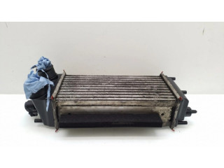 Интеркулер  0FT766K775BA   Ford Transit Courier 1.6