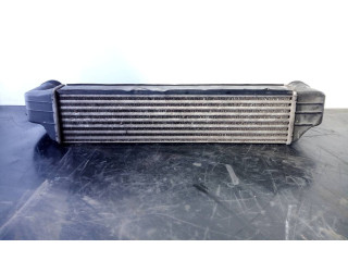 Интеркулер 77897930, 1787779 BMW X3 E83