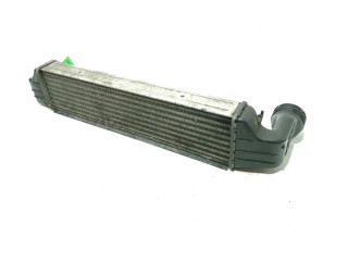 Интеркулер  1787779, 77897930   BMW X3 E83 