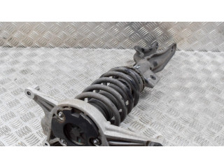 Передний амортизатор