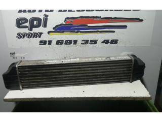 Интеркулер  77897930   BMW X3 E83 