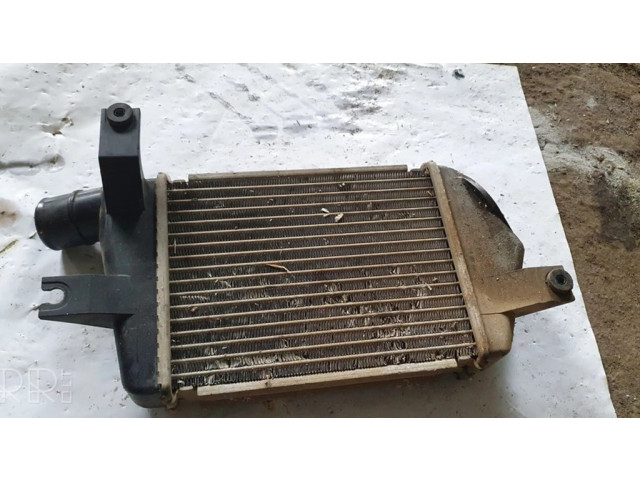 Интеркулер MN135001, TG127100250 Mitsubishi L200 2.5