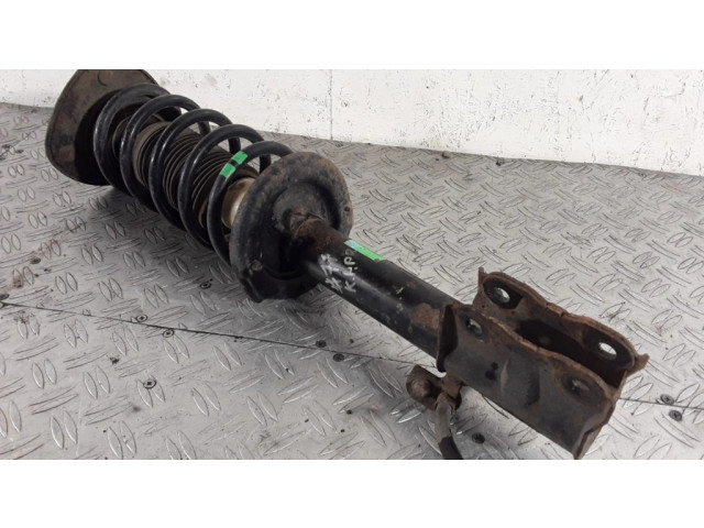 Передний амортизатор