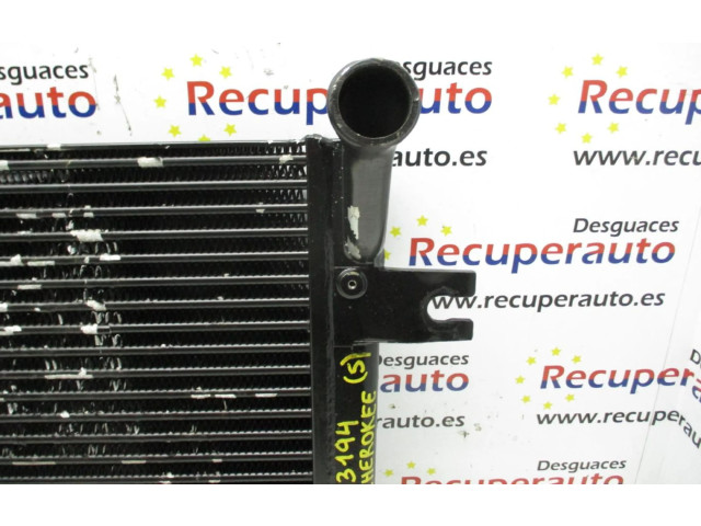 Интеркулер  52079970AA   Jeep Grand Cherokee (WJ) 2.7