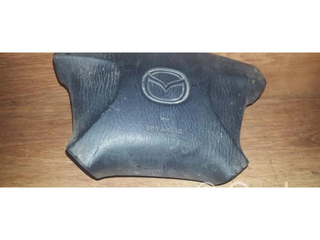 Подушка безопасности водителя ge4t57k00 Mazda 626