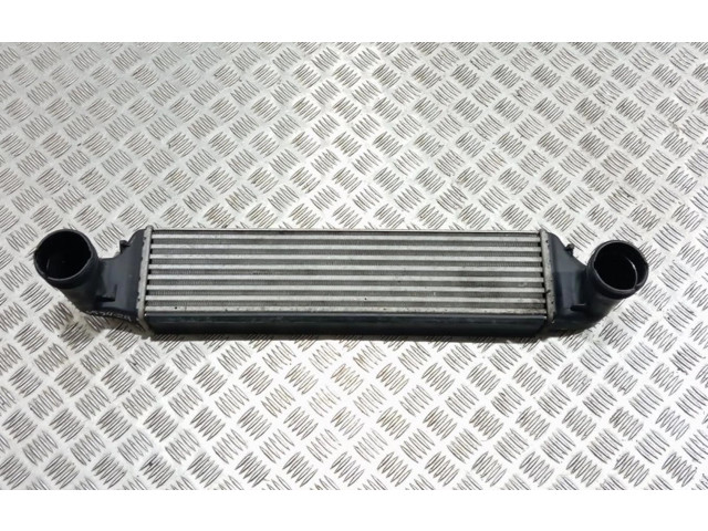 Интеркулер  77897930   BMW X3 E83 