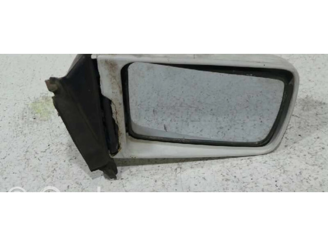 Зеркало электрическое правое Mitsubishi Colt 1989-1992 года