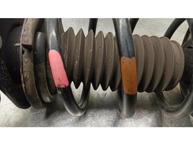 Передний амортизатор