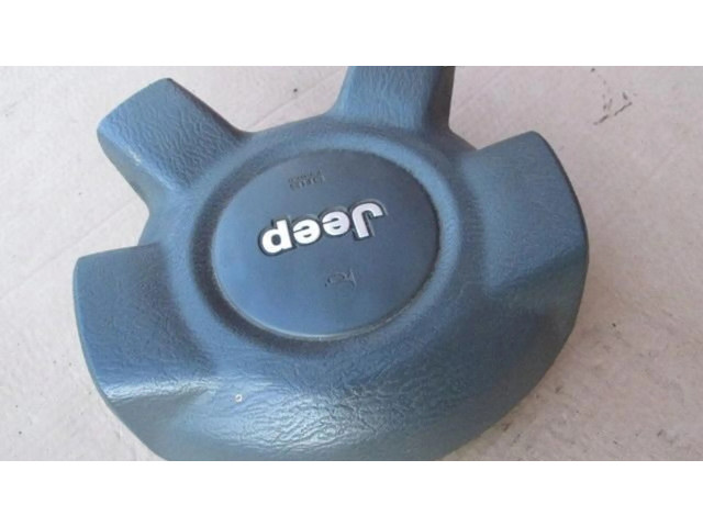 Подушка безопасности водителя    Jeep Cherokee III KJ