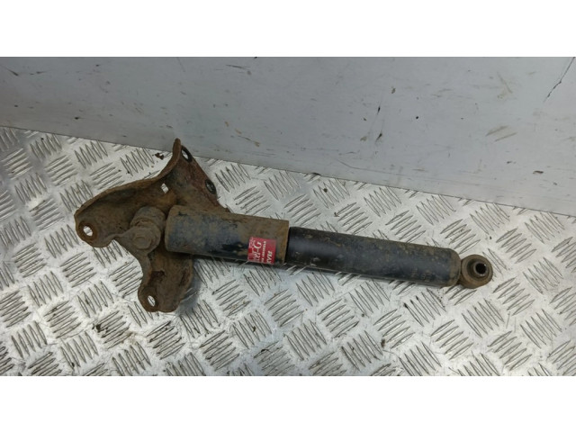 Задний aмортизатор