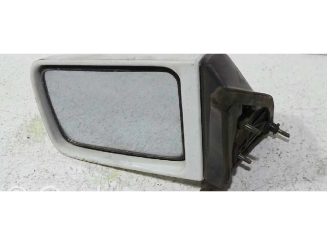 Зеркало электрическое левое Mitsubishi Colt 1989-1992 года