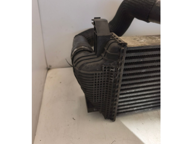 Интеркулер 55038006AE, 55038004AD Jeep Grand Cherokee